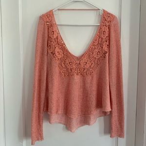 Pink light beach sweater, open flower detail back